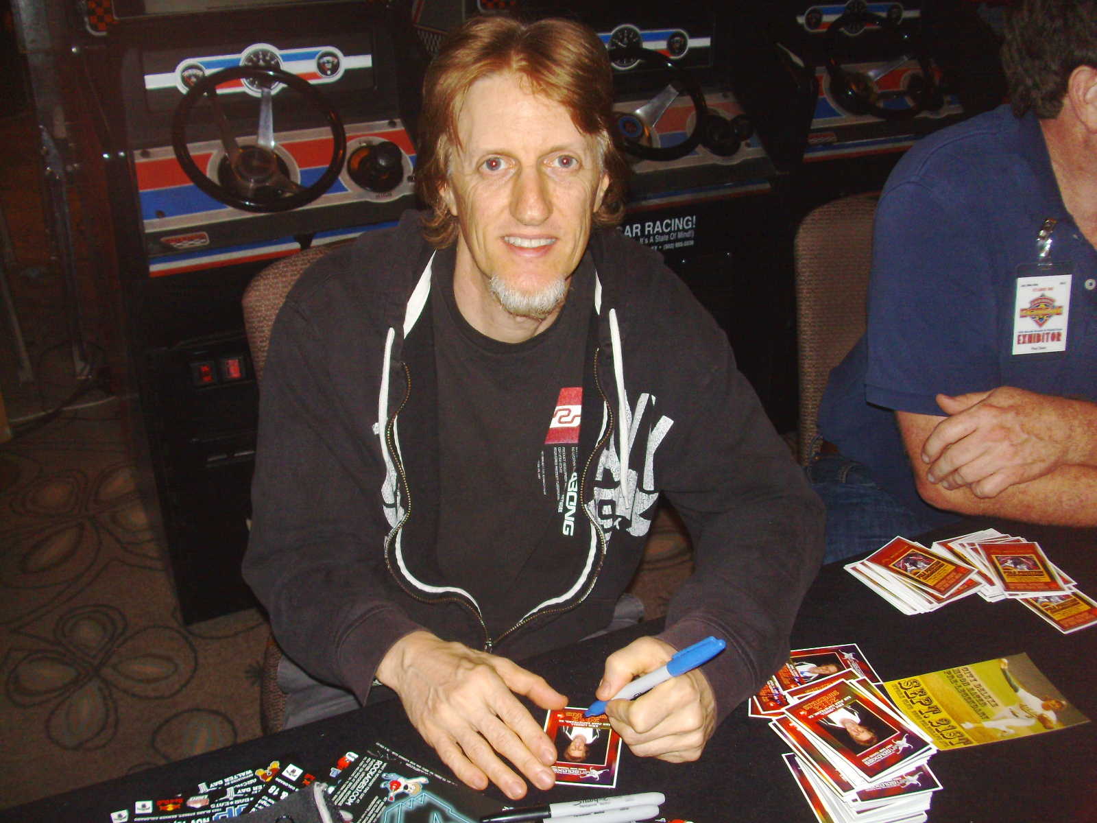 Eric Signing his cards at CAX 2012